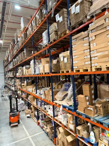 Pallet racks and a forklift in the Pack4you warehouse